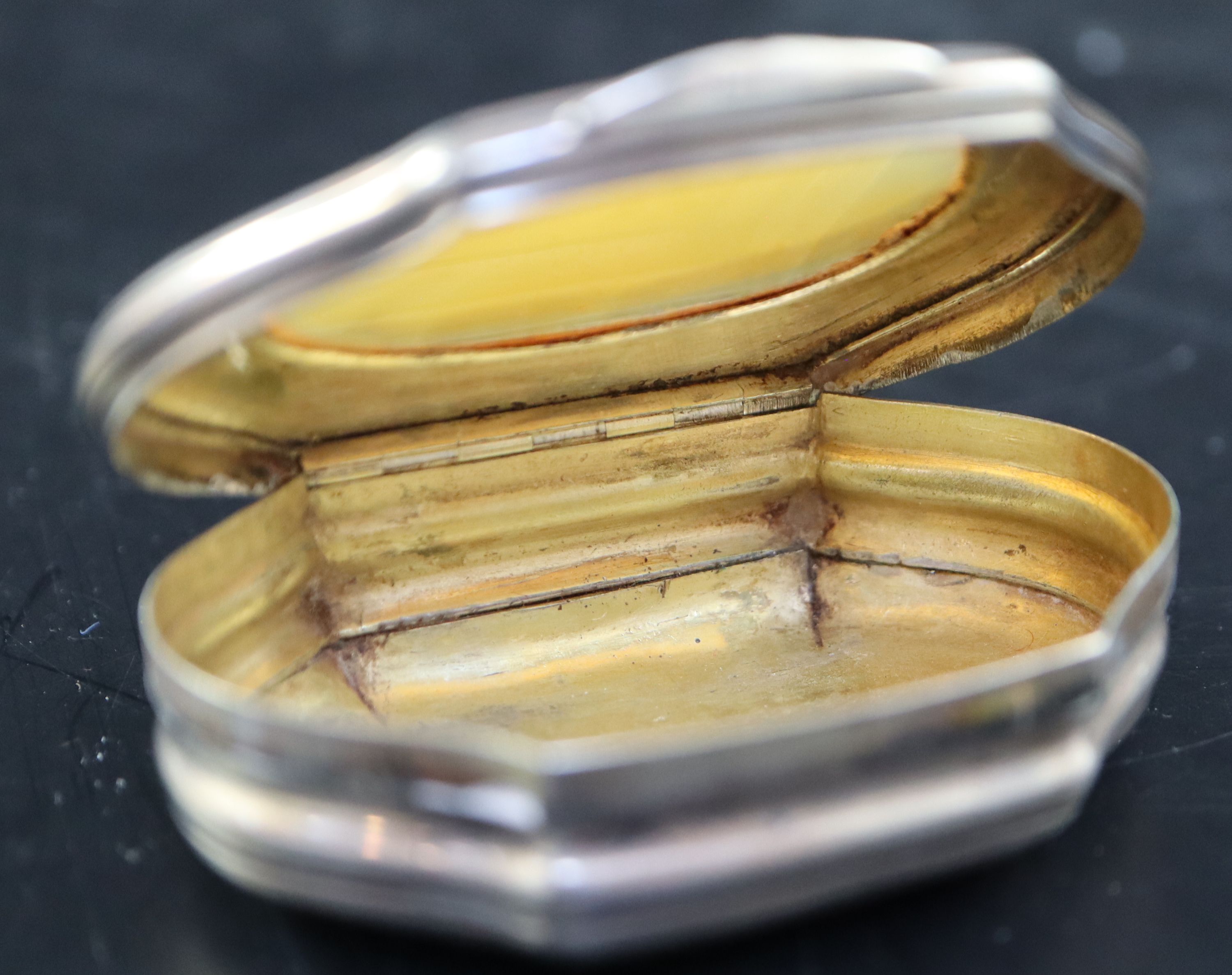 A 19th century Continental engraved white metal snuff box, 57mm, gross 31 grams.